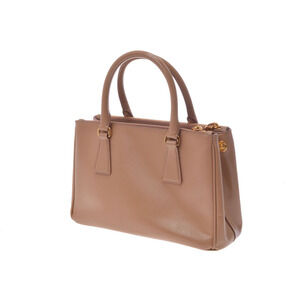 Prada Tan enamel Pink handbag Beige strap